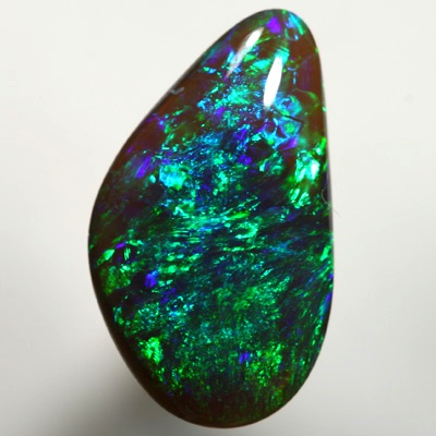 SOLID BLACK CRYSTAL OPAL Sparkling greens and blues, 3 dimensional pattern. SEE VIDEO